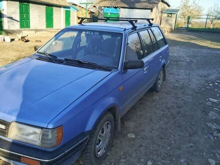 Мазда 323 1987 в Жмеренке на Automoto.ua Синий Мазда 323, объемом двигателя 1.5 л и пробегом 450 тыс. км за 1400 $, фото 1 на Automoto.ua