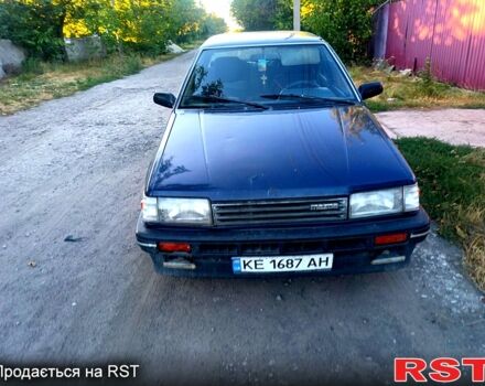 Синий Мазда 323, объемом двигателя 1.7 л и пробегом 300 тыс. км за 1000 $, фото 1 на Automoto.ua