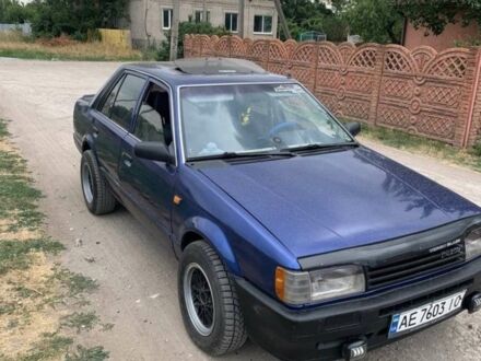 Синій Мазда 323, об'ємом двигуна 1.5 л та пробігом 300 тис. км за 1350 $, фото 1 на Automoto.ua