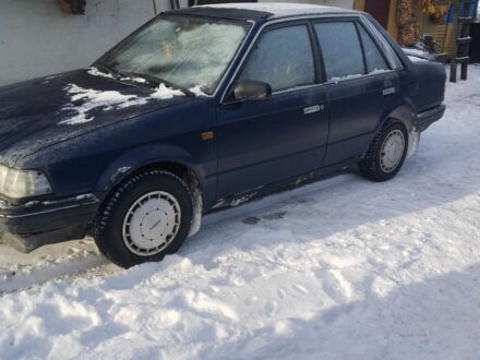 Синій Мазда 323, об'ємом двигуна 1.5 л та пробігом 300 тис. км за 900 $, фото 1 на Automoto.ua