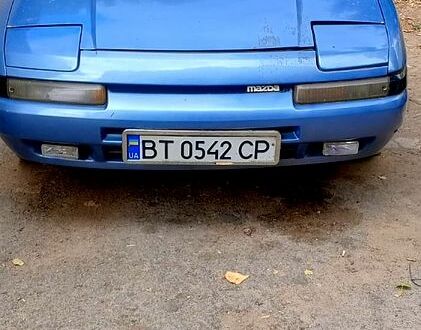 Синий Мазда 323, объемом двигателя 1.6 л и пробегом 188 тыс. км за 900 $, фото 1 на Automoto.ua