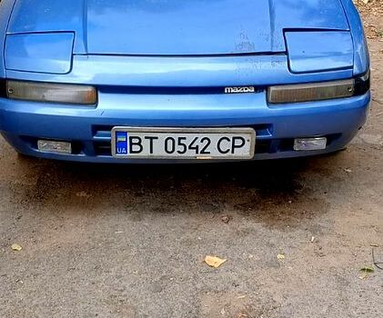 Синий Мазда 323, объемом двигателя 1.6 л и пробегом 188 тыс. км за 900 $, фото 1 на Automoto.ua