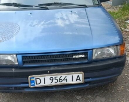 Синій Мазда 323, об'ємом двигуна 0 л та пробігом 250 тис. км за 702 $, фото 1 на Automoto.ua
