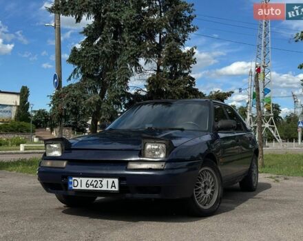 Синій Мазда 323, об'ємом двигуна 1.6 л та пробігом 250 тис. км за 1200 $, фото 1 на Automoto.ua