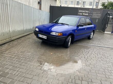 Мазда 323 1990 у Каменце-Подольском на Automoto.ua Синій Мазда 323, об'ємом двигуна 1.3 л та пробігом 285 тис. км за 1550 $, фото 1 на Automoto.ua