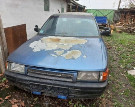 Синий Мазда 323, объемом двигателя 1.3 л и пробегом 240 тыс. км за 400 $, фото 1 на Automoto.ua