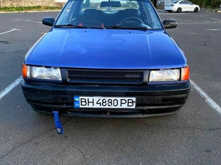 Синій Мазда 323, об'ємом двигуна 1.3 л та пробігом 0 тис. км за 1200 $, фото 1 на Automoto.ua