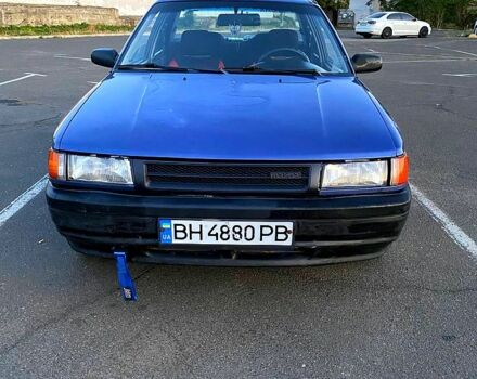 Синій Мазда 323, об'ємом двигуна 1.3 л та пробігом 0 тис. км за 1200 $, фото 1 на Automoto.ua