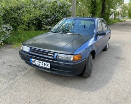 Синий Мазда 323, объемом двигателя 1.3 л и пробегом 600 тыс. км за 950 $, фото 1 на Automoto.ua