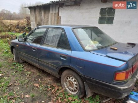 Синий Мазда 323, объемом двигателя 1.3 л и пробегом 240 тыс. км за 400 $, фото 1 на Automoto.ua