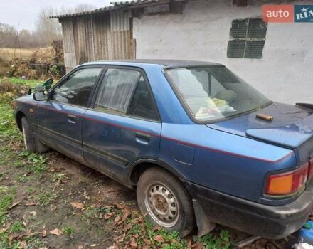 Синий Мазда 323, объемом двигателя 1.3 л и пробегом 240 тыс. км за 350 $, фото 1 на Automoto.ua