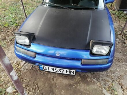 Синий Мазда 323, объемом двигателя 1.6 л и пробегом 10 тыс. км за 1426 $, фото 1 на Automoto.ua