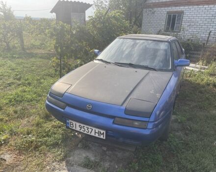 Синий Мазда 323, объемом двигателя 1.6 л и пробегом 333 тыс. км за 674 $, фото 1 на Automoto.ua