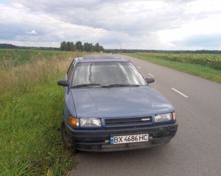 Синій Мазда 323, об'ємом двигуна 1.3 л та пробігом 300 тис. км за 550 $, фото 1 на Automoto.ua