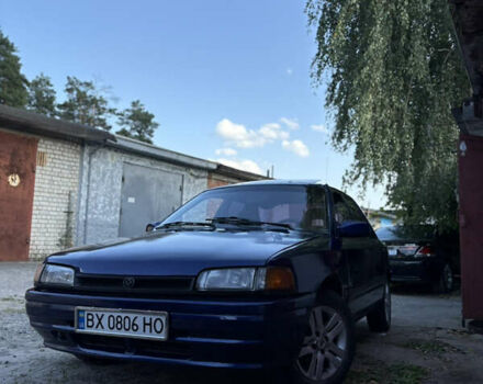 Синій Мазда 323, об'ємом двигуна 1.6 л та пробігом 220 тис. км за 999 $, фото 1 на Automoto.ua