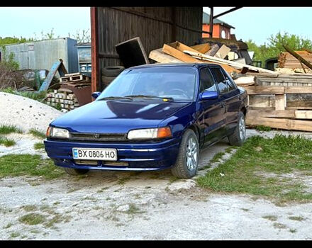 Синій Мазда 323, об'ємом двигуна 1.6 л та пробігом 220 тис. км за 1499 $, фото 1 на Automoto.ua