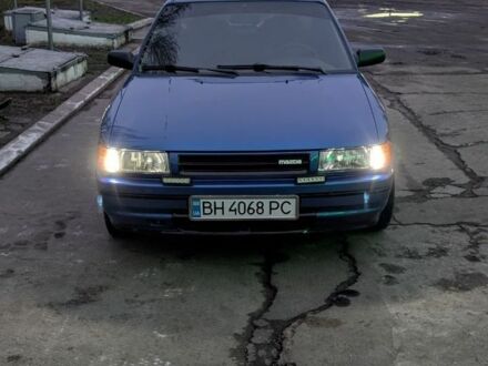 Синій Мазда 323, об'ємом двигуна 1.6 л та пробігом 300 тис. км за 2300 $, фото 1 на Automoto.ua