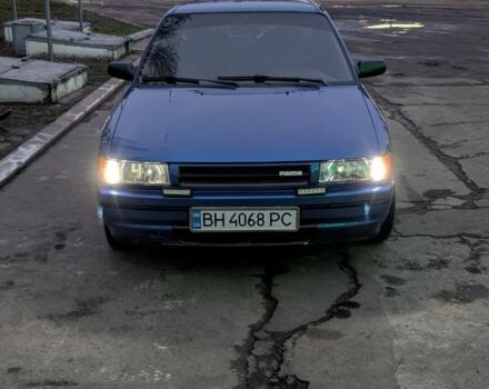 Синий Мазда 323, объемом двигателя 1.6 л и пробегом 300 тыс. км за 2300 $, фото 1 на Automoto.ua