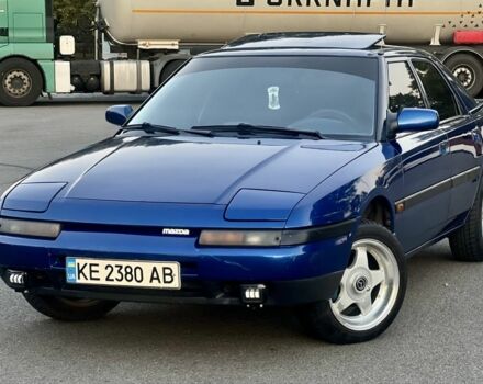 Синій Мазда 323, об'ємом двигуна 1.6 л та пробігом 250 тис. км за 3299 $, фото 1 на Automoto.ua