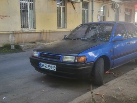 Мазда 323 1993 у Чорноморську (Іллічівську) на Automoto.ua Синій Мазда 323, об'ємом двигуна 1.7 л та пробігом 460 тис. км за 775 $, фото 1 на Automoto.ua