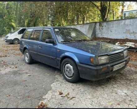 Синий Мазда 323, объемом двигателя 0 л и пробегом 300 тыс. км за 600 $, фото 1 на Automoto.ua