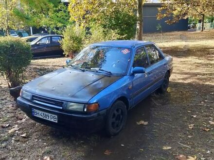 Синий Мазда 323, объемом двигателя 1.7 л и пробегом 350 тыс. км за 850 $, фото 1 на Automoto.ua