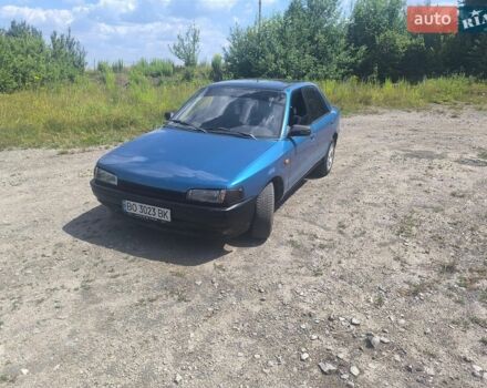 Синий Мазда 323, объемом двигателя 1.69 л и пробегом 300 тыс. км за 1300 $, фото 1 на Automoto.ua