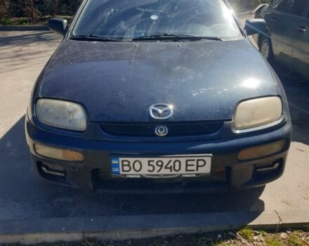 Синий Мазда 323, объемом двигателя 1.5 л и пробегом 260 тыс. км за 1500 $, фото 1 на Automoto.ua