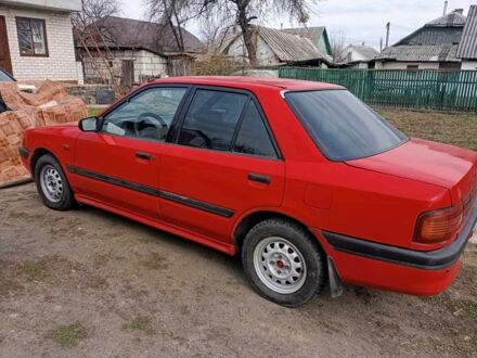 Синий Мазда 323, объемом двигателя 2.2 л и пробегом 250 тыс. км за 1100 $, фото 1 на Automoto.ua