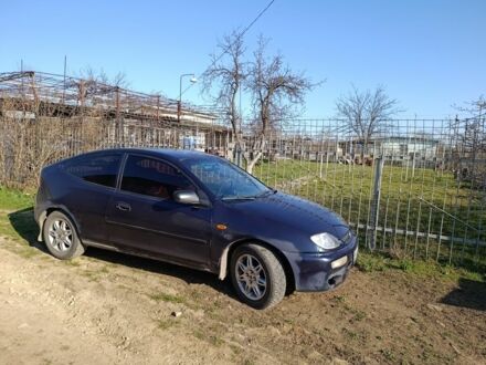 Синій Мазда 323, об'ємом двигуна 1.3 л та пробігом 230 тис. км за 1300 $, фото 1 на Automoto.ua