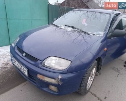 Синий Мазда 323, объемом двигателя 1.32 л и пробегом 330 тыс. км за 800 $, фото 1 на Automoto.ua