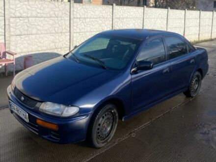 Синій Мазда 323, об'ємом двигуна 1.5 л та пробігом 478 тис. км за 1900 $, фото 1 на Automoto.ua
