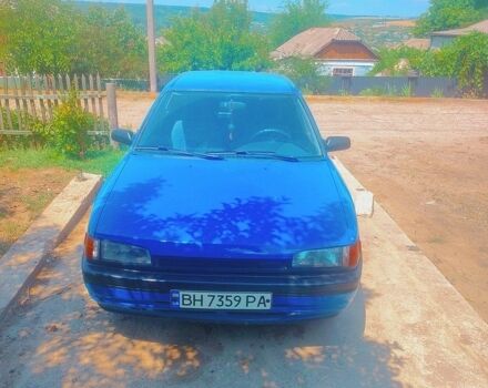 Синий Мазда 323, объемом двигателя 1.6 л и пробегом 300 тыс. км за 1250 $, фото 1 на Automoto.ua
