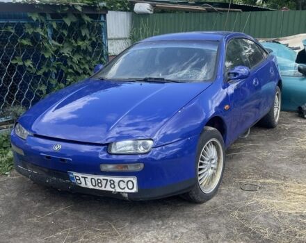 Синий Мазда 323, объемом двигателя 1.5 л и пробегом 70 тыс. км за 0 $, фото 1 на Automoto.ua