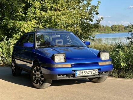 Синий Мазда 323, объемом двигателя 1.8 л и пробегом 435 тыс. км за 3400 $, фото 1 на Automoto.ua
