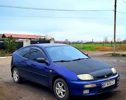 Синій Мазда 323, об'ємом двигуна 1.3 л та пробігом 200 тис. км за 1150 $, фото 1 на Automoto.ua