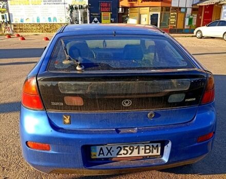 Синий Мазда 323, объемом двигателя 1.5 л и пробегом 165 тыс. км за 1200 $, фото 1 на Automoto.ua