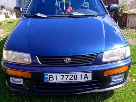Синій Мазда 323, об'ємом двигуна 1.3 л та пробігом 429 тис. км за 2100 $, фото 1 на Automoto.ua