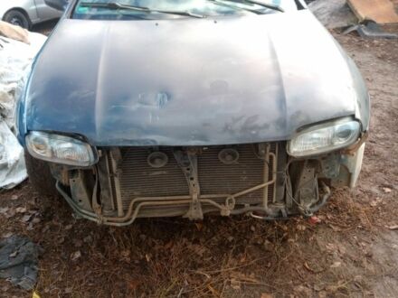 Синій Мазда 323, об'ємом двигуна 1.8 л та пробігом 345 тис. км за 700 $, фото 1 на Automoto.ua