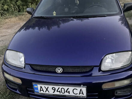 Синий Мазда 323, объемом двигателя 1.32 л и пробегом 376 тыс. км за 1100 $, фото 1 на Automoto.ua