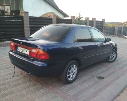 Синій Мазда 323, об'ємом двигуна 1.3 л та пробігом 280 тис. км за 3150 $, фото 1 на Automoto.ua