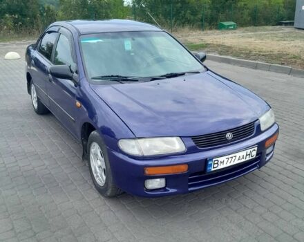 Синій Мазда 323, об'ємом двигуна 1.5 л та пробігом 316 тис. км за 2199 $, фото 1 на Automoto.ua