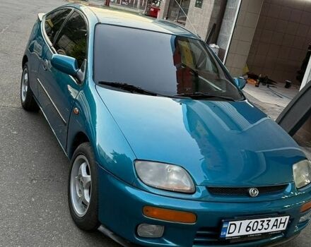 Синій Мазда 323, об'ємом двигуна 1.3 л та пробігом 325 тис. км за 2200 $, фото 1 на Automoto.ua