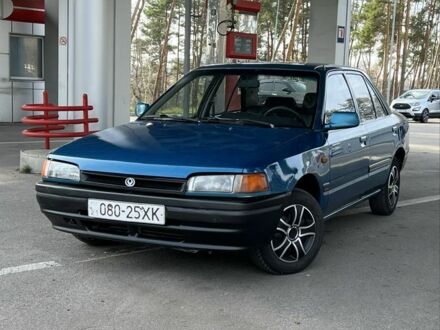 Синий Мазда 323, объемом двигателя 1.6 л и пробегом 250 тыс. км за 1900 $, фото 1 на Automoto.ua