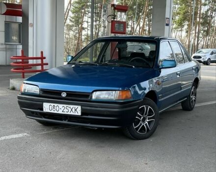 Синий Мазда 323, объемом двигателя 1.6 л и пробегом 250 тыс. км за 1900 $, фото 1 на Automoto.ua