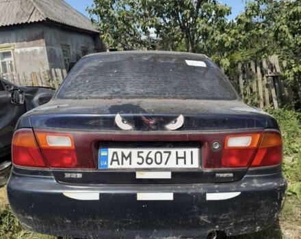 Синий Мазда 323, объемом двигателя 1.5 л и пробегом 247 тыс. км за 503 $, фото 1 на Automoto.ua