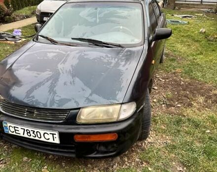 Синий Мазда 323, объемом двигателя 1.3 л и пробегом 300 тыс. км за 1300 $, фото 1 на Automoto.ua