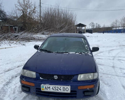 Синій Мазда 323, об'ємом двигуна 1.5 л та пробігом 250 тис. км за 999 $, фото 1 на Automoto.ua