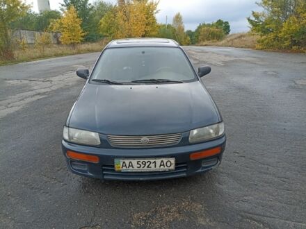 Синій Мазда 323, об'ємом двигуна 1.5 л та пробігом 250 тис. км за 1450 $, фото 1 на Automoto.ua