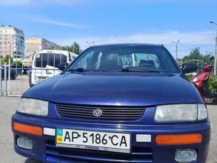 Синий Мазда 323, объемом двигателя 1.5 л и пробегом 295 тыс. км за 2300 $, фото 1 на Automoto.ua